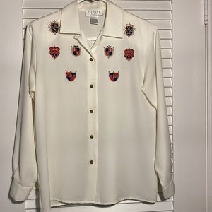 Petite Sophisticate 90s dressy cream longsleeve blouse, embroidered coat of arms